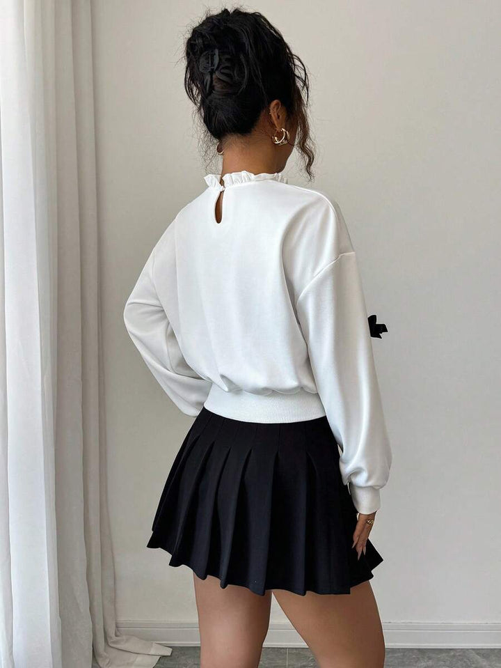 Joann short bow sweater