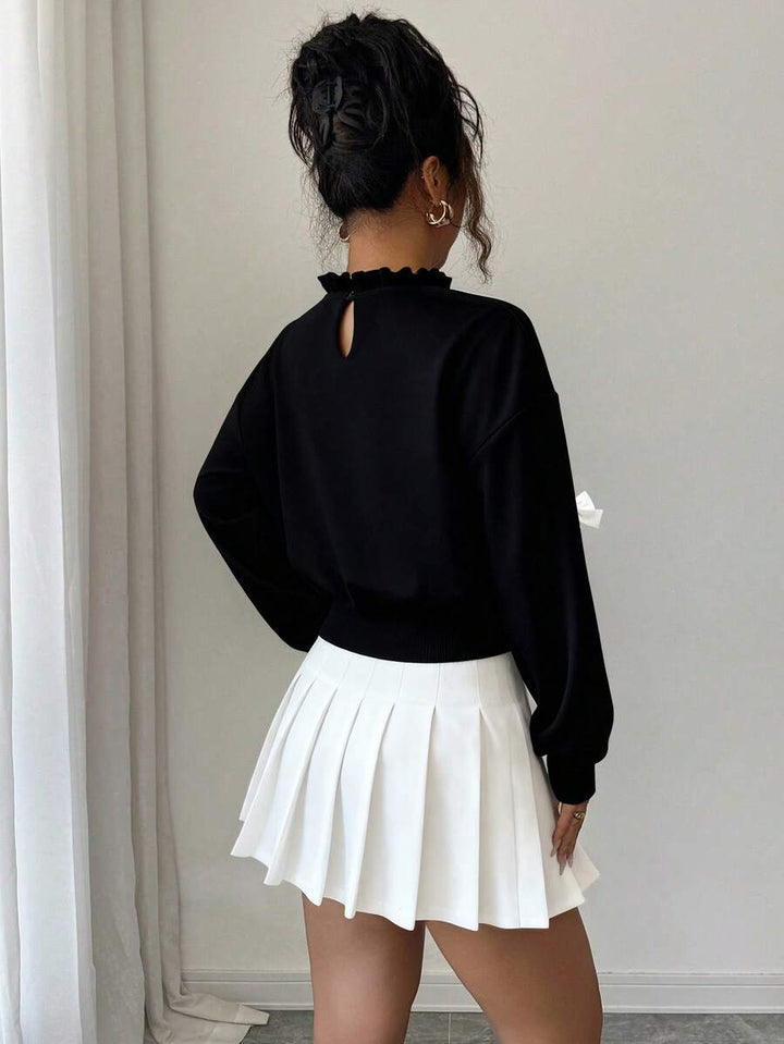 Joann short bow sweater