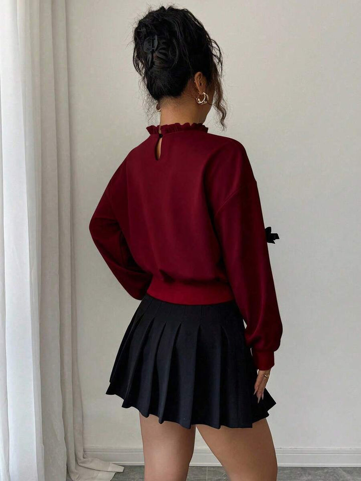 Joann short bow sweater
